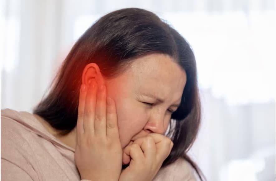 Chiropractor in Minot providing gentle ear infection treatment for a child at CornerStone Chiropractic