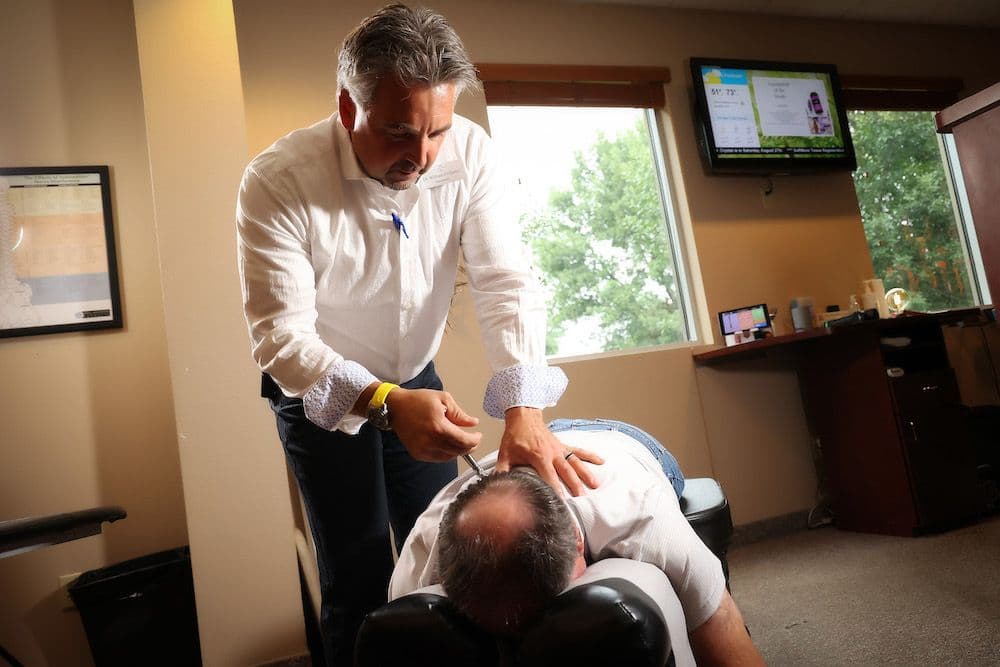 Activator technique for preventative chiropractic care at CornerStone Chiropractic clinic in Minot, ND