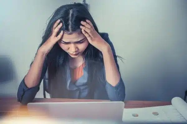 Migraine relief through spinal adjustment at Minot chiropractic clinic
