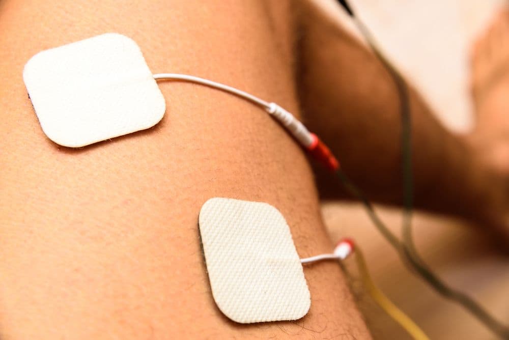 Electrotherapy e-stim treatment for pain relief at CornerStone Chiropractic in Minot, ND