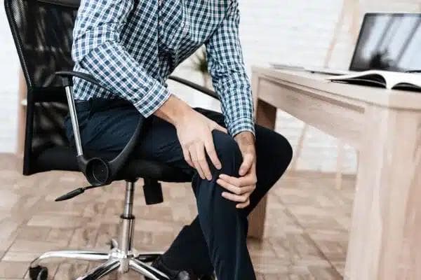 Chiropractic knee adjustment for pain relief in Minot, North Dakota
